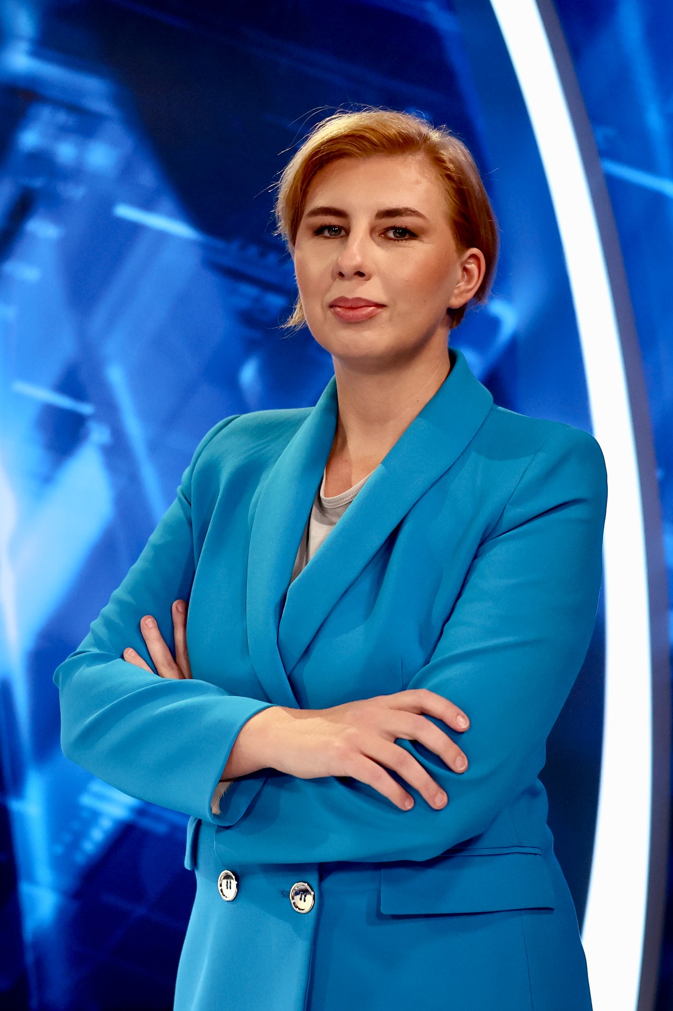 Lejla Nuhanović in a blue suit during a television appearance